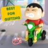 Crayon Shin-chan pull-back tricycle action figure featuring Shinchan riding a green bicycle.