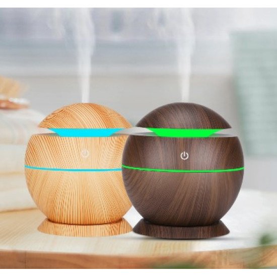 ultrasonic aroma diffuser features a wood-grain finish and a color-changing LED light.